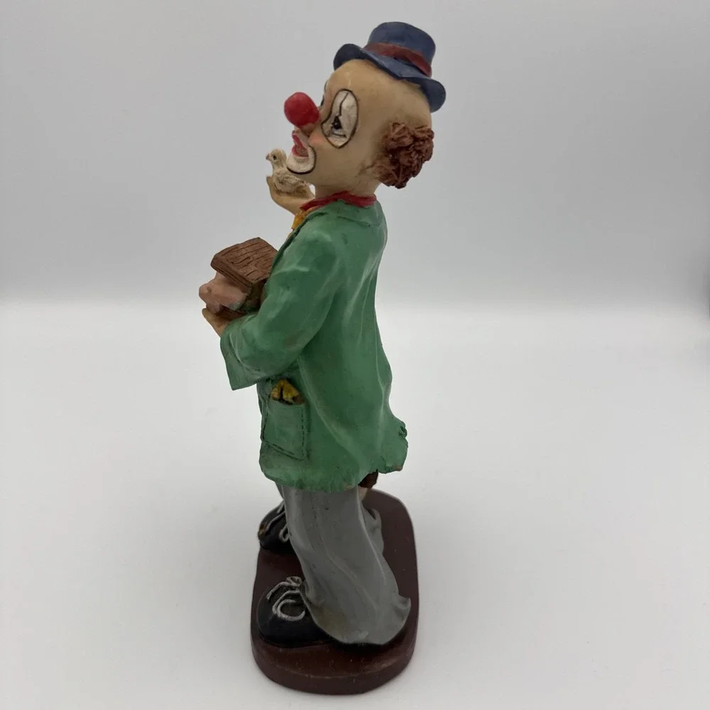 Vintage Clown Figurine With Bird In Hand And Dog Standing On A Ball